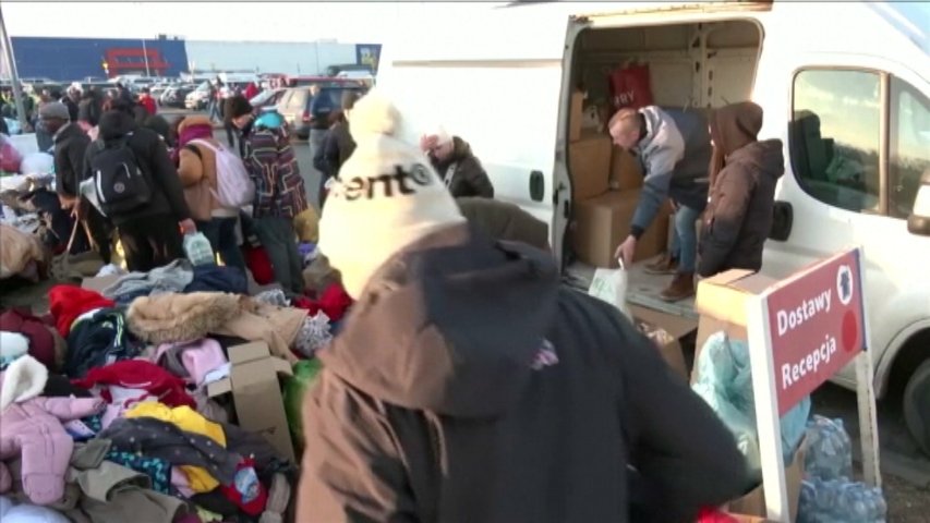 Refugiados ucranianos en la frontera con Rusia